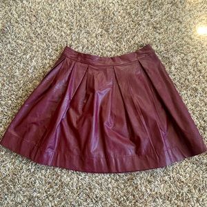 Maroon faux leather pleated skirt